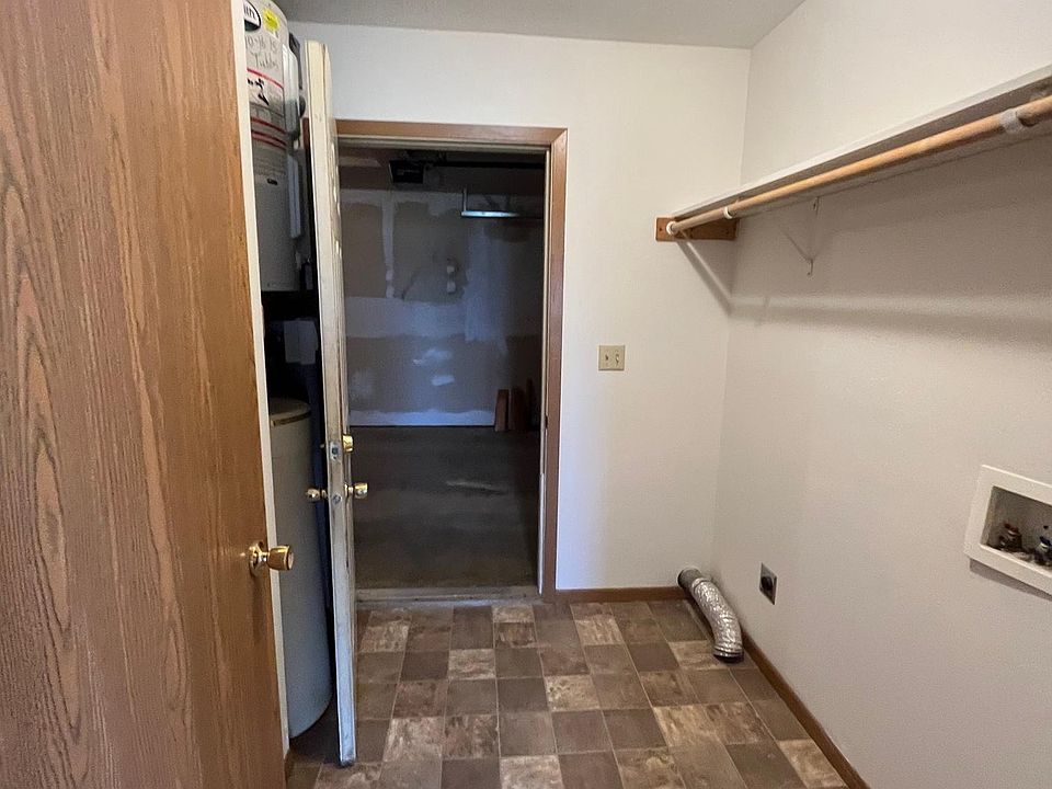 garage entrance - washer/dryer hook-ups on the right side in photo.