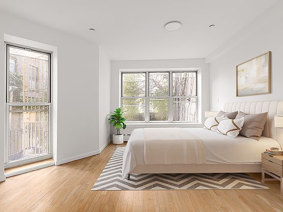 5th image of 239 E 7th St APT 1