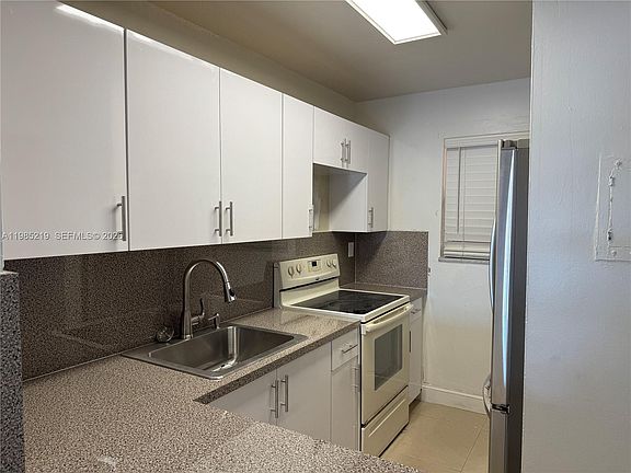 4th image of 6055 W 19th Ave APT 311