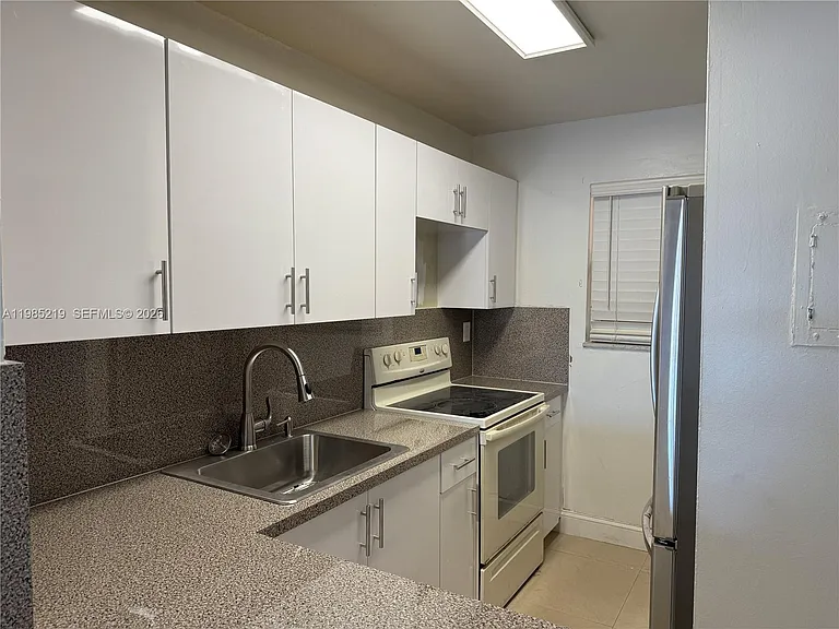 6055 W 19th Ave #311 — Photo 4