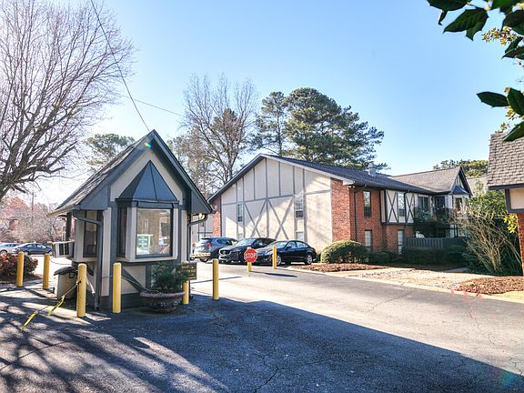 Community entrance with security guard