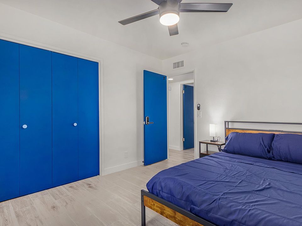 Large closet, working station and full length mirror behind the door.