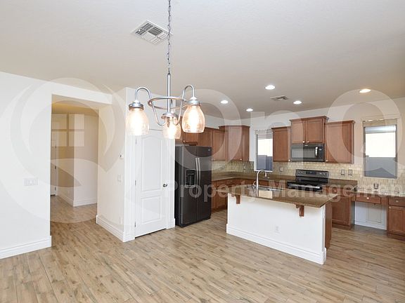 5th image of 3889 S Vineyard Ave