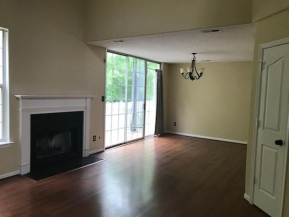 Large open floorplane with vaulted ceilings and hardwood flo