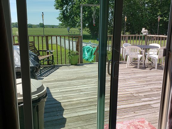 Looking out patio doors to backyard