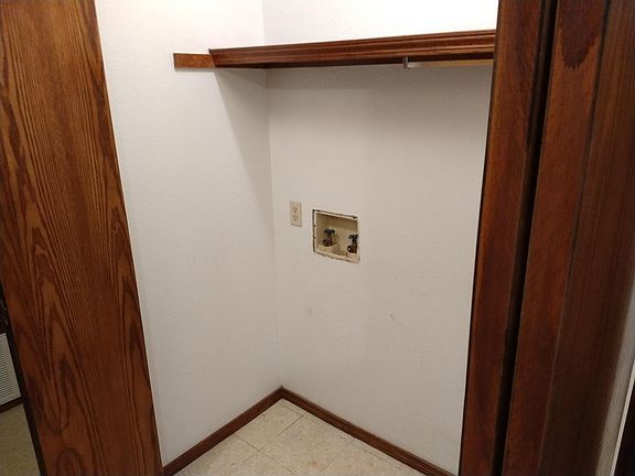 Laundry hook-up in hall