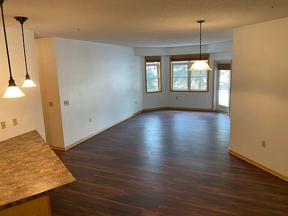 Living room with door to private balcony