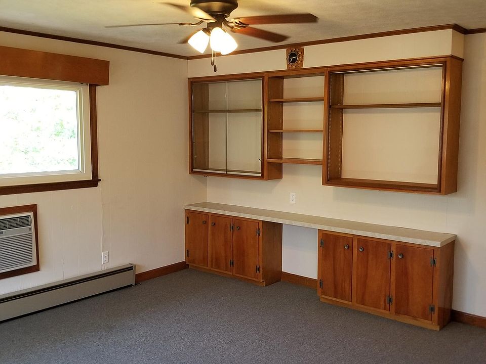 LIving area storage with built in entertainment system space