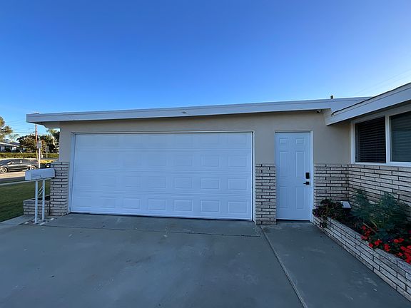 Car garage door opens to the washer dryer area which we have provided for your use lots of storage in this garage