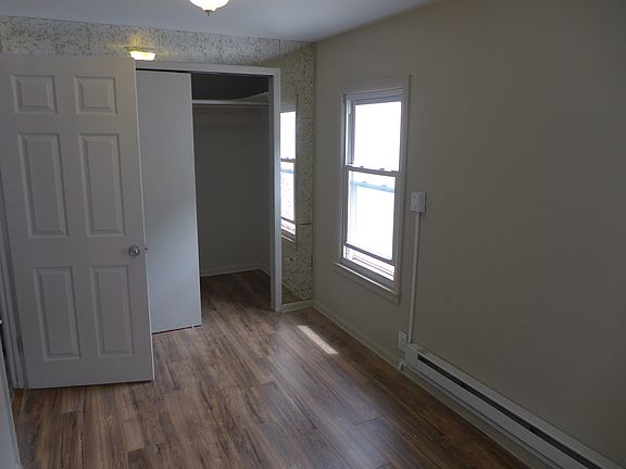 Bedroom with walk-in closet