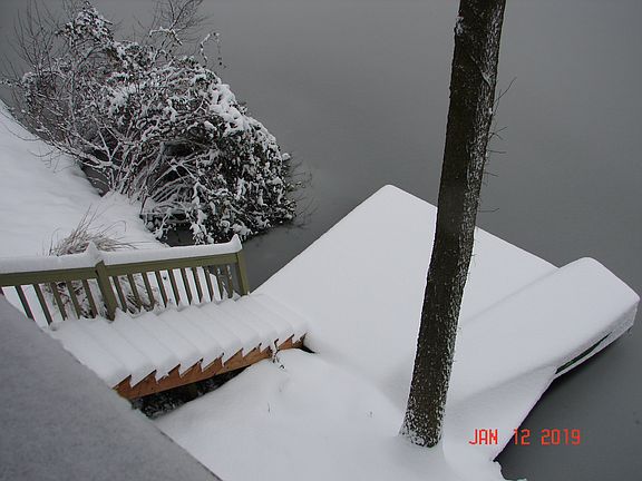 Dock and boat in winter