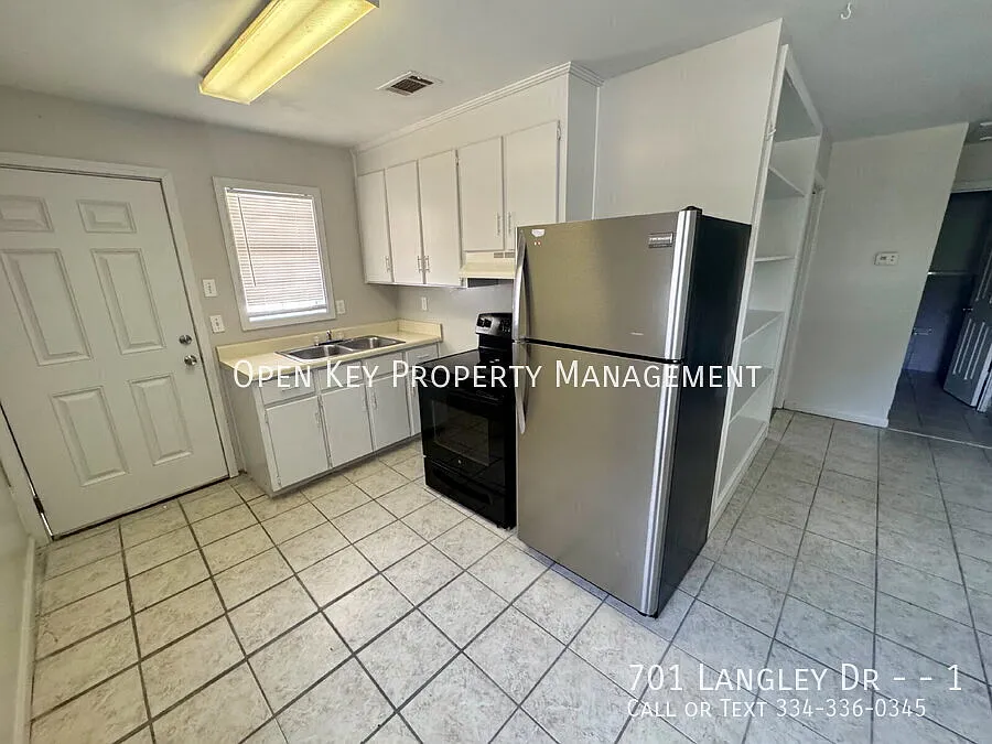2 BR/1BA, Section 8 approved rental - LVP flooring, appliances included, conveniently located in ... — Photo 3