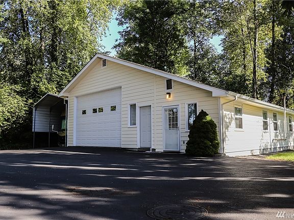 Shop with RV parking and Craft/Canning/Guest room.