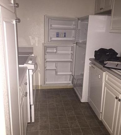 Kitchen with pass through to the living room