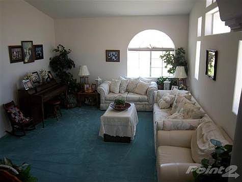 Gorgeous sunken living room is so inviting to your guests.