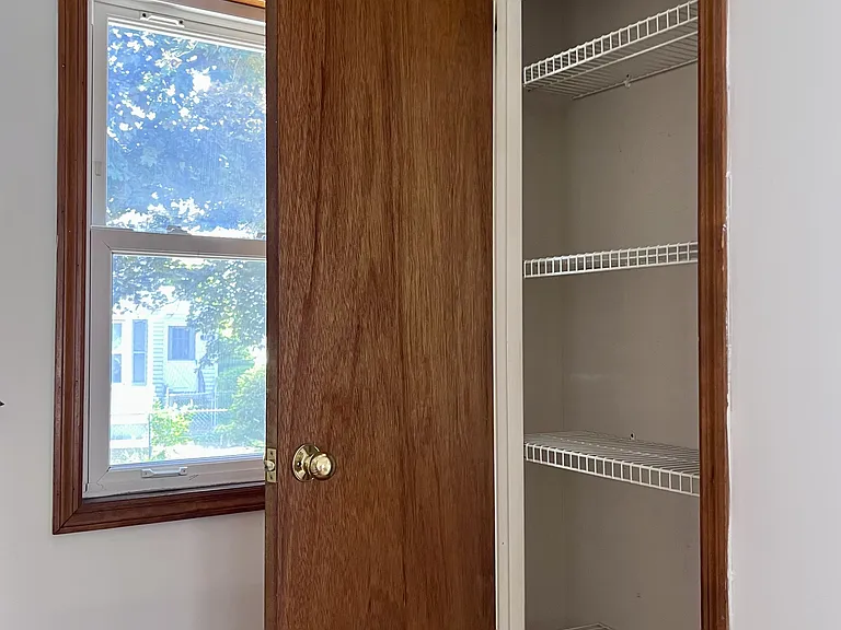 Stairway storage/linen closet