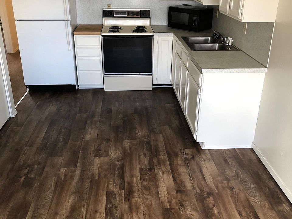 Spacious kitchen with large front window. Washer/Dryer hookups in pantry closet next to kitchen.