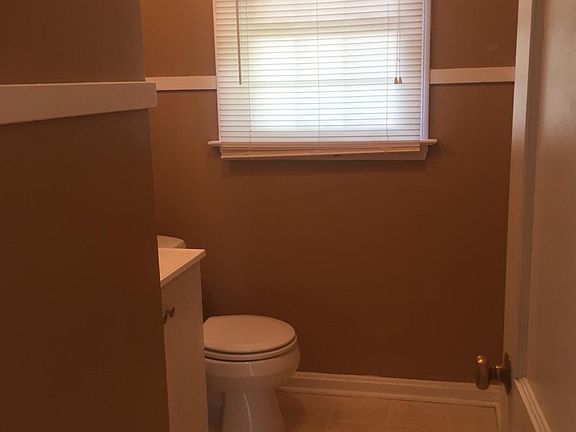 Half bath first floor. Also basement opens to backyard