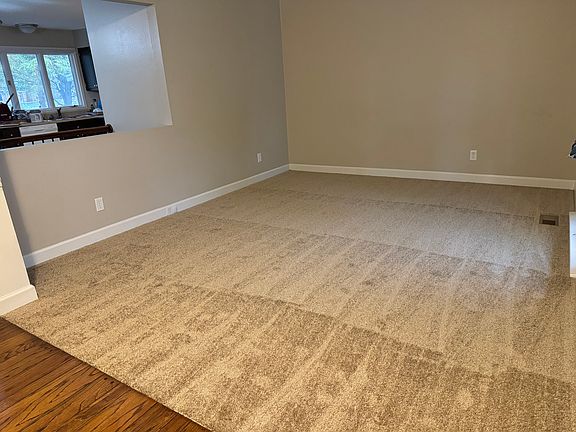 Living Room with brand new carpeting