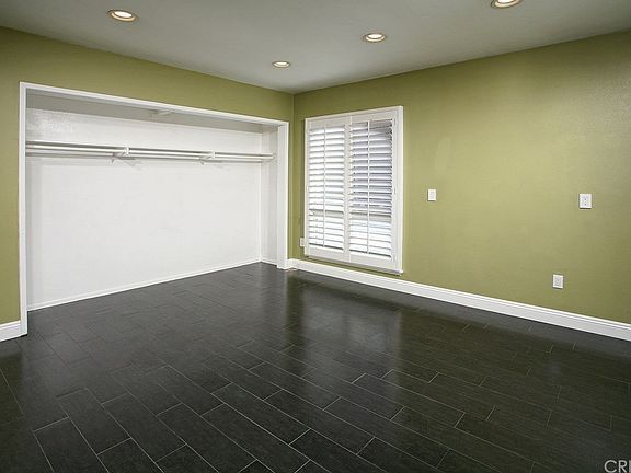 Spacious master suite with recessed lighting, plan