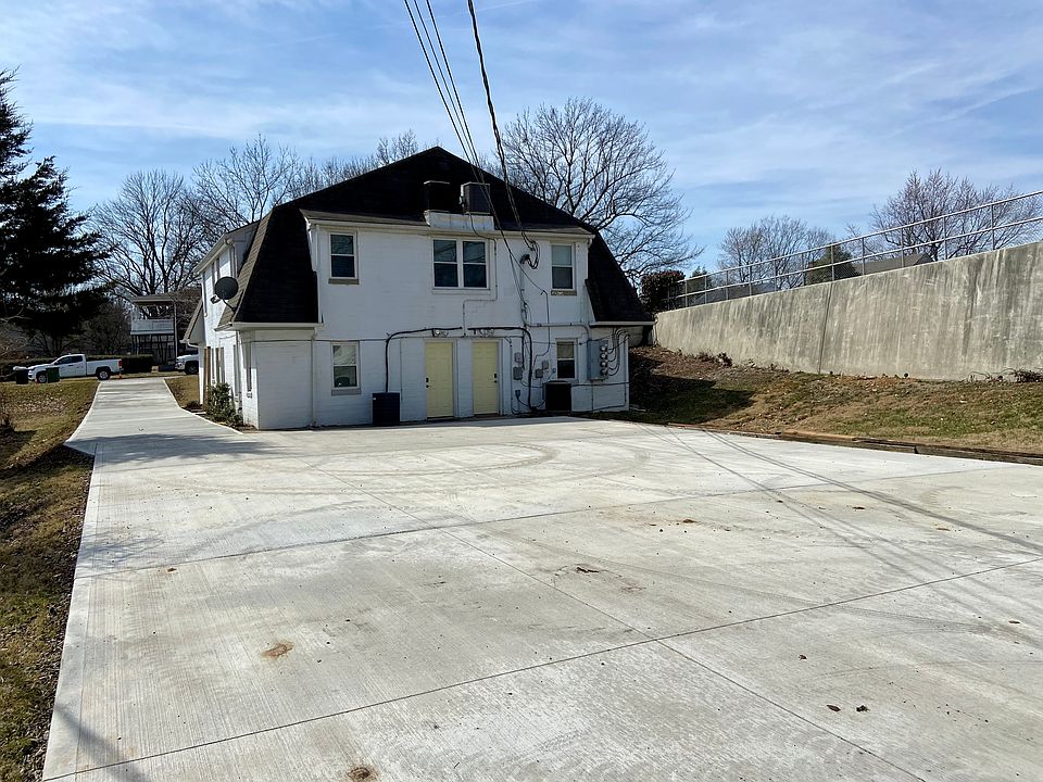 large concrete parking are out back.