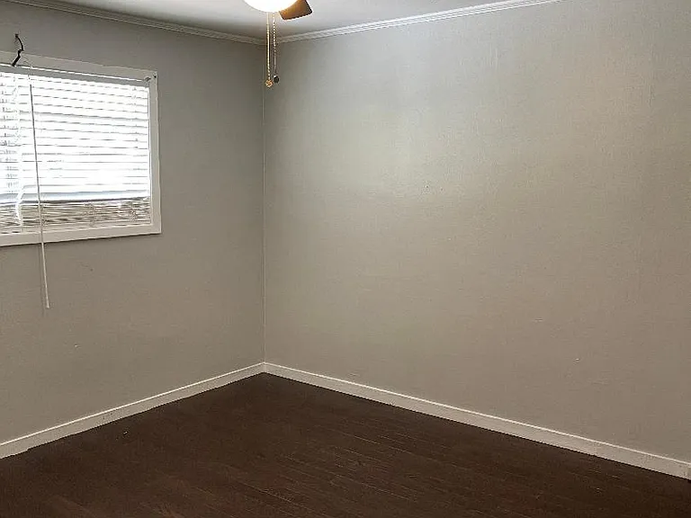 This room could be considered as the master although all three rooms are nearly 12 feet wide.
