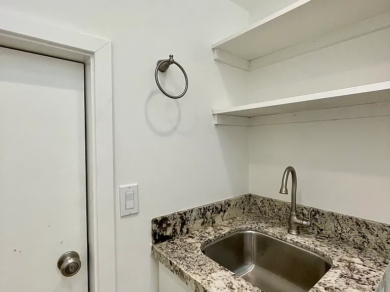 Laundry room sink.