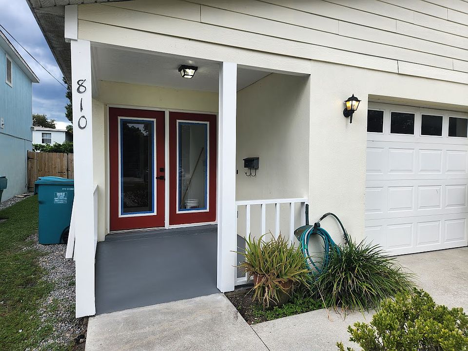 Inviting front entry with covered porch, attractive double doors allowing ample lighting. Garage entry is also available off kitchen.