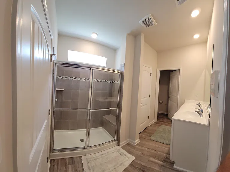 Master bathroom has a shower, private toilet and dual vanity