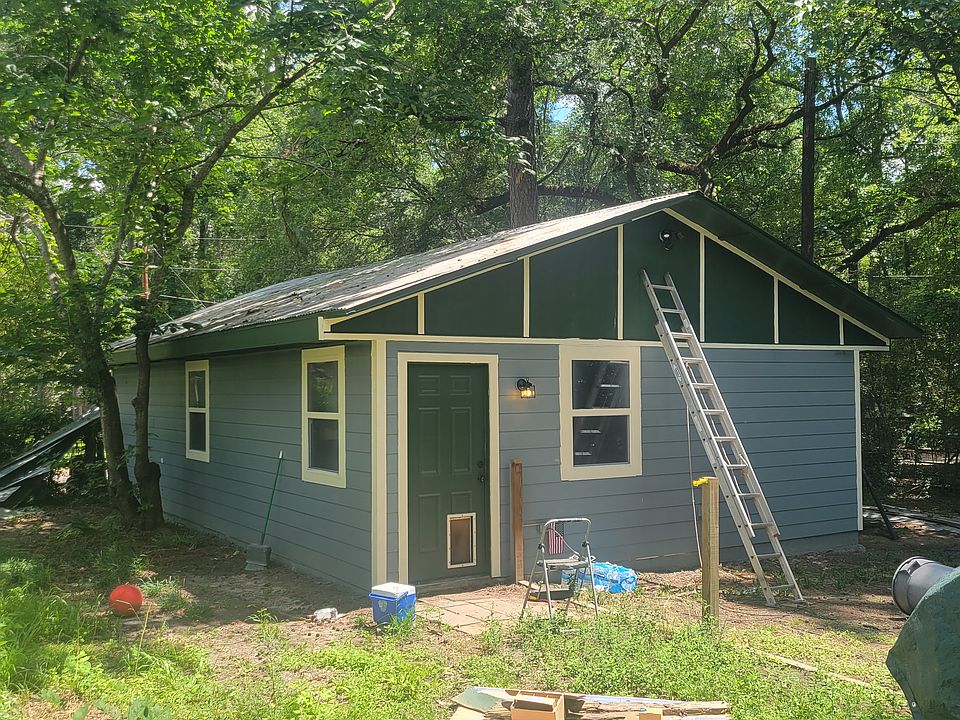 New siding and fresh paint adorn this country cottage.