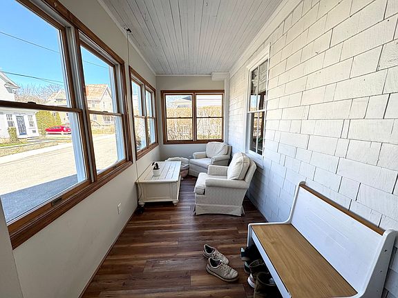 Private front porch at the entrance to the home. This furnisher does NOT come with property.