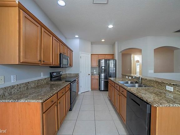 4th image of 8202 Whistling Pine Way