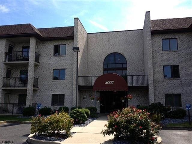 Front of building, condo is on second floor on left.