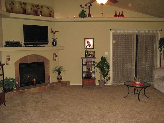 Family room with cable hookup above gas fireplace