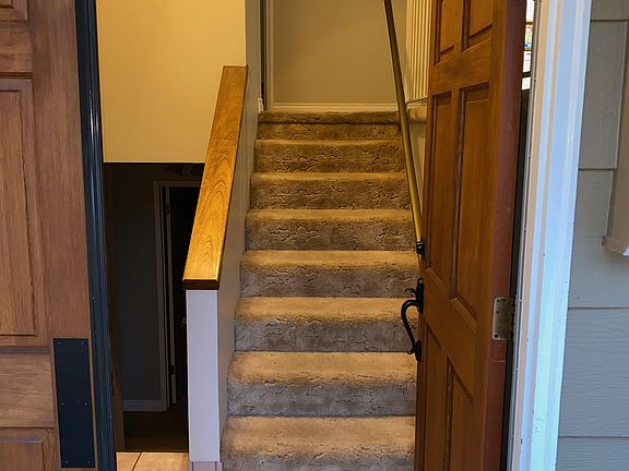 Front entrance/stairs up and down