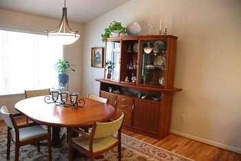 The dining area has a vaulted ceiling increasing the open feeling.  It also has direct access to the three season room.