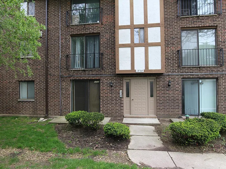 Exterior. Property is window and patio door on the bottom left. Next to the DuPage River.
