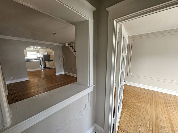 From front entry. Bonus room at right. Living room at left.