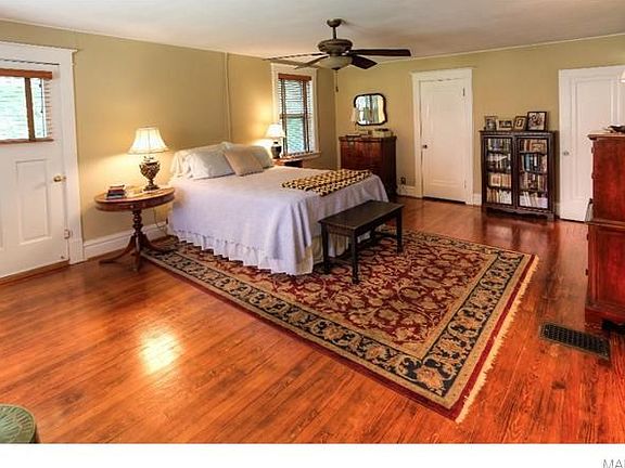 The master bedroom suite is huge with lots of closet space, a great master bathroom, and a large dec