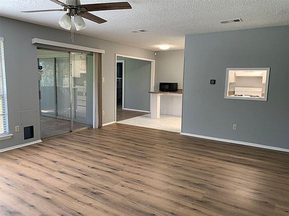 4th image of 10015 NW Woodland Village Dr