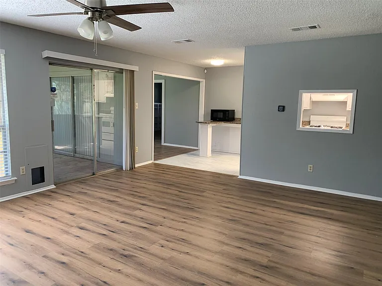 10015 NW Woodland Village Dr — Photo 4