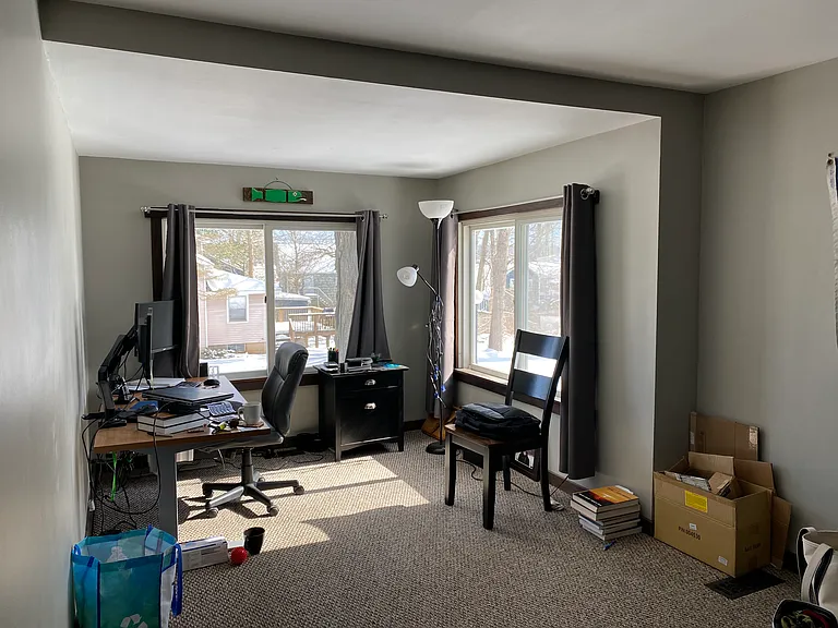 Main floor bedroom/ or office space. With double door closet.