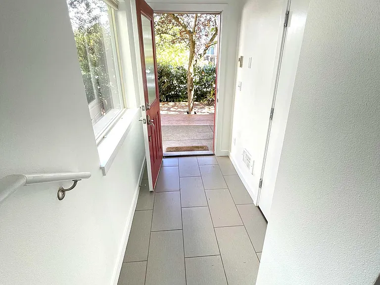 Looking out front entry to deck