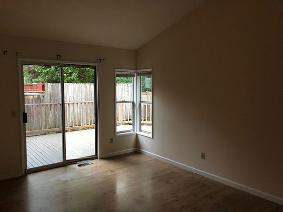 Large Master Bedroom with Vaulted Ceilings and Separate Slid