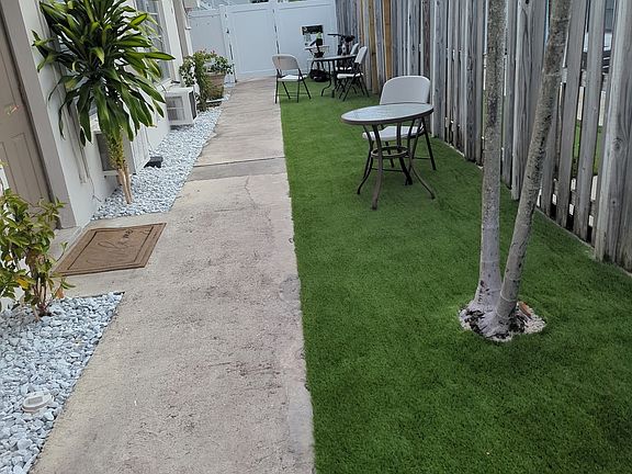 Well maintained outside space with sitting area