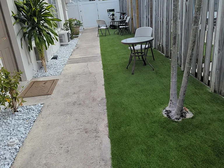 Well maintained outside space with sitting area