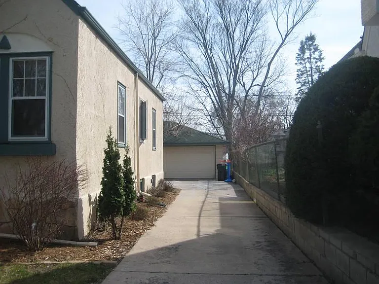 Driveway to detached garage in back