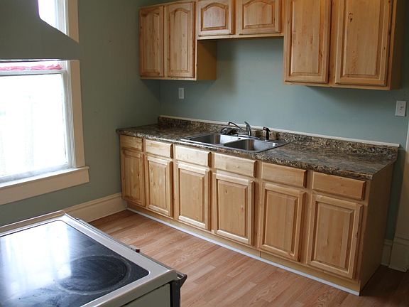 Glass top stove and fridge provided