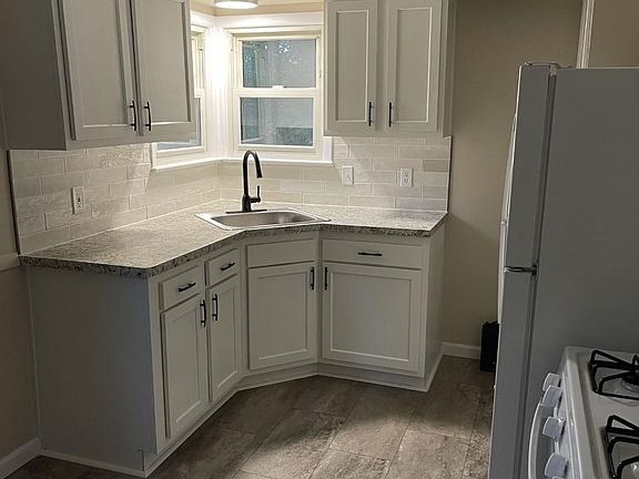 Brand new kitchen, refrigerator and stove included.