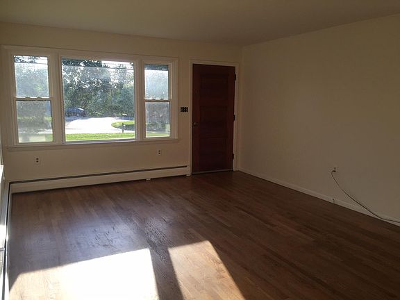 hardwood floor and neutral paint! Sunny rooms